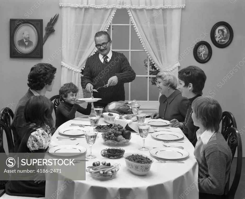 1970S Three Generation Family Sitting At Thanksgiving Turkey Dinner Turkey Table