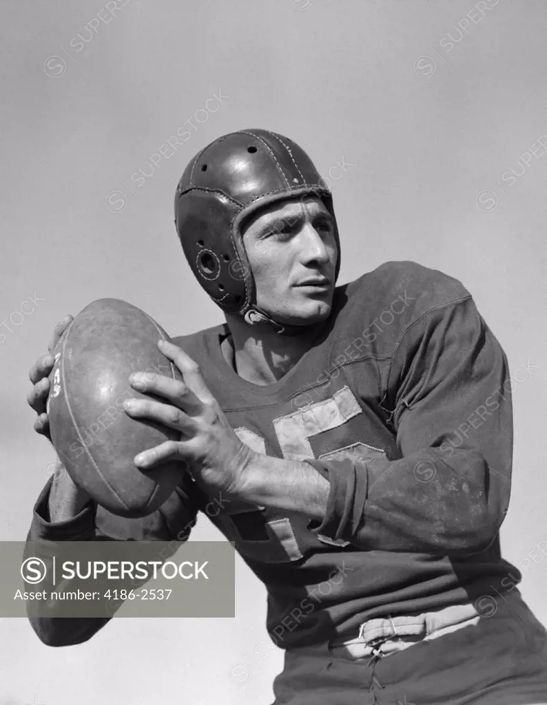 1940S 1950S Quarterback About To Throw A Pass Football