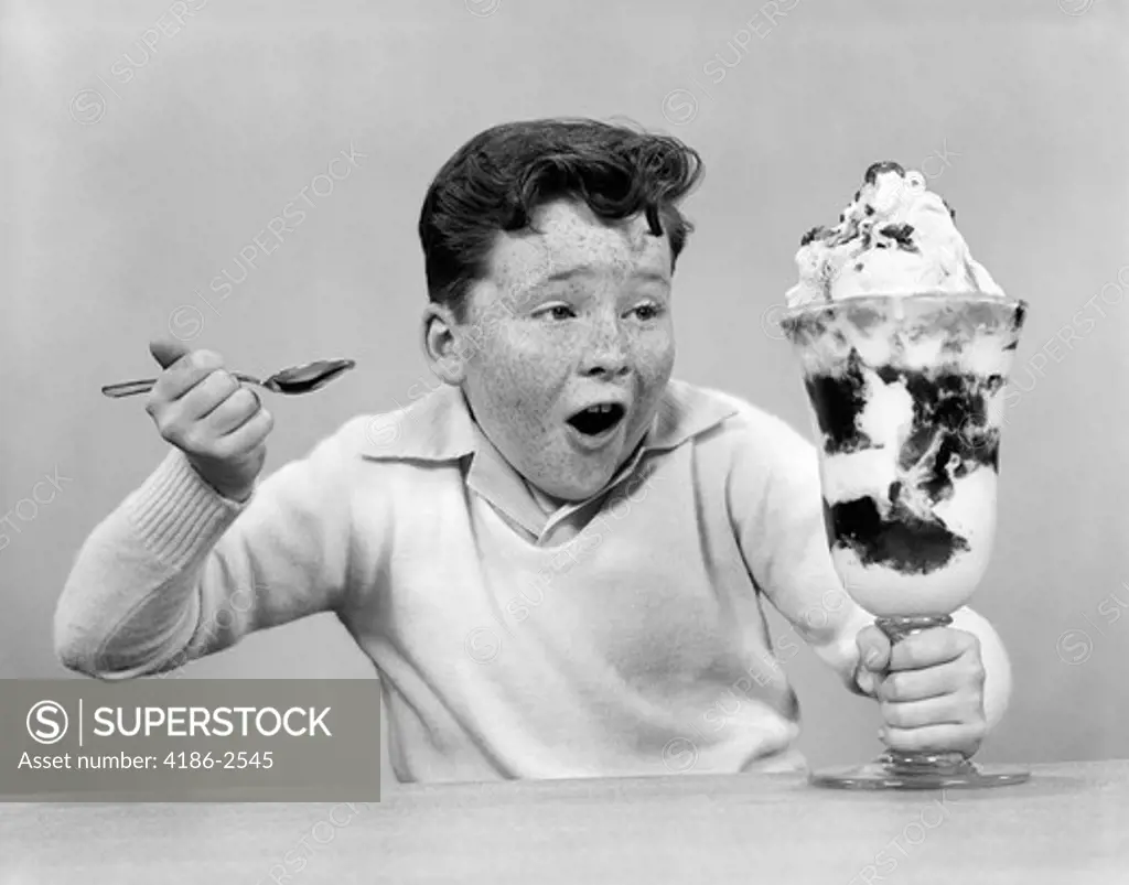 1950S Freckled Boy Digging Into Giant Sundae