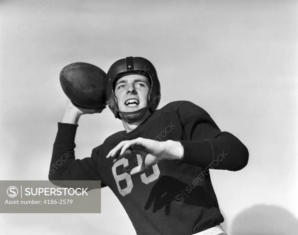 1950S Football Player Quarterback Arm Back About To Pass Ball Helmet Uniform Jersey Number 60