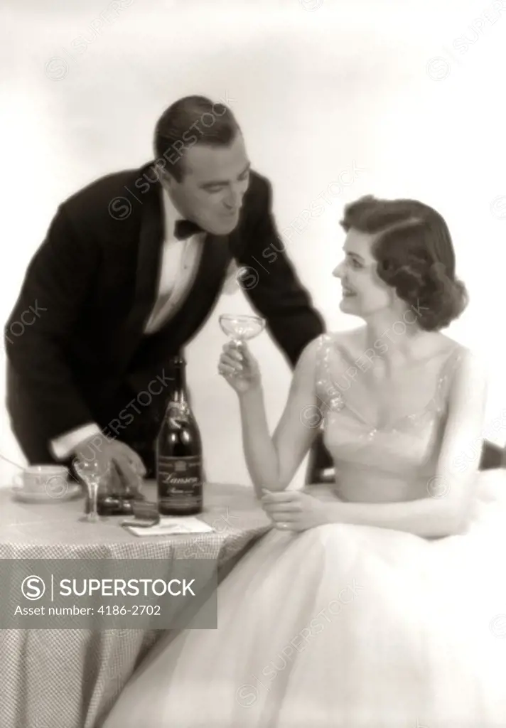 1950S Formal Dress Couple Man In Tuxedo Woman Wearing Gown Holding Champagne Glass