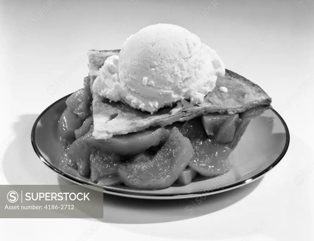 1960S Still Life Of Slice Of Peach Pie With Vanilla Ice Cream On Top 