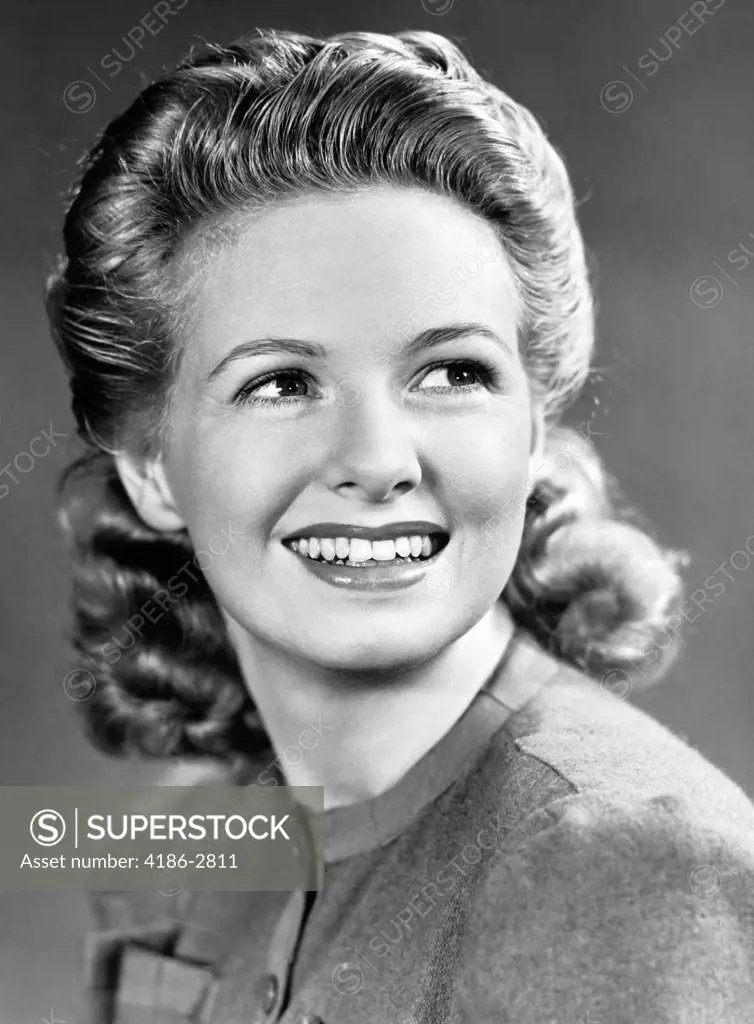1940S Portrait Of Smiling Woman With Long Blond Curly Hair