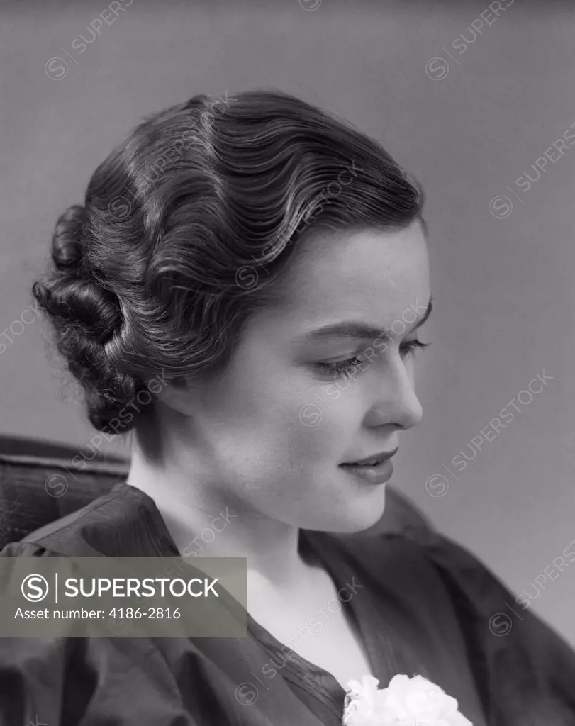 1930S 1940S Thoughtful Brunette Woman In Profile With Wavy Hair