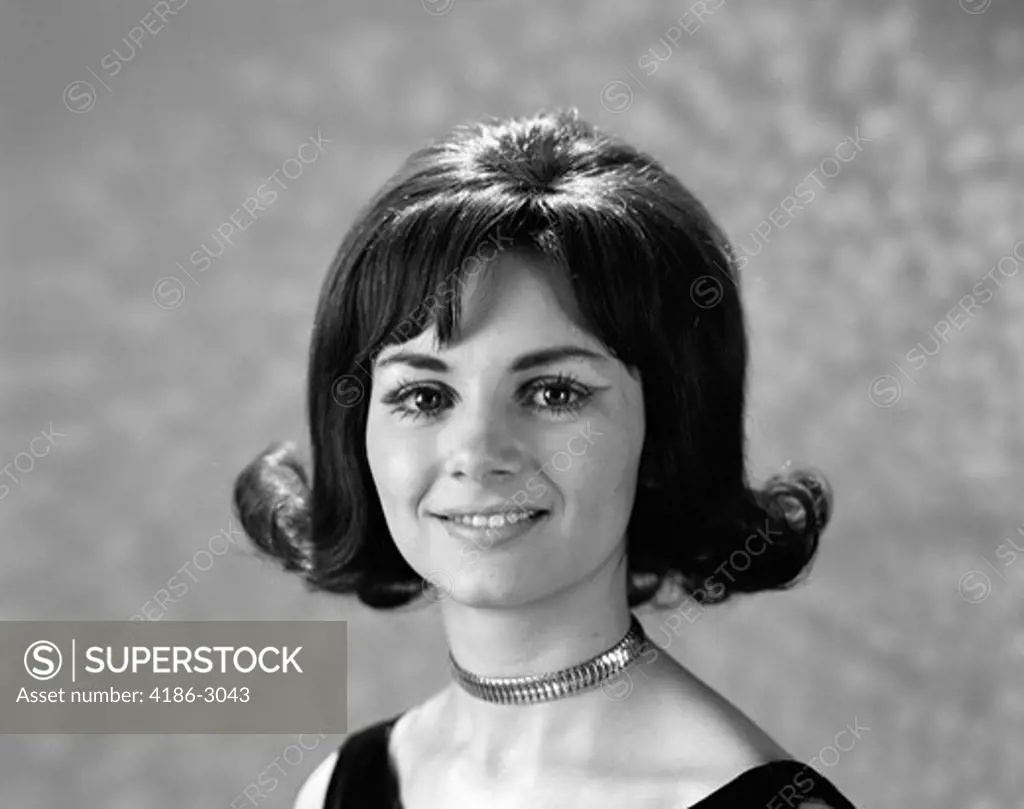 1960S 1970S Portrait Smiling Brunette Woman Flip Hair Style With Bangs