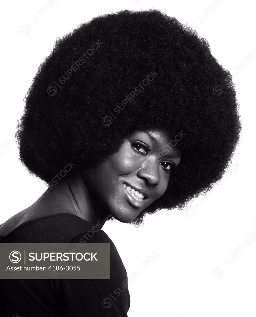 1970S Portrait Of Smiling Black Woman With Large Afro Leaning Into Frame From Side