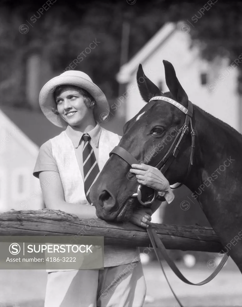1930S Woman In Hat Smiling Looking Aside Wearing Striped Tie Holding Reins And Horses Head Snaffle Hunter Bridle