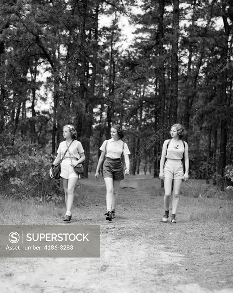 1940S Three Young Women Walking In Woods Hiking