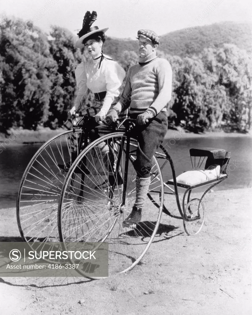 1890S Family Riding On Unusual Tandem Bicycle With Baby In Rear