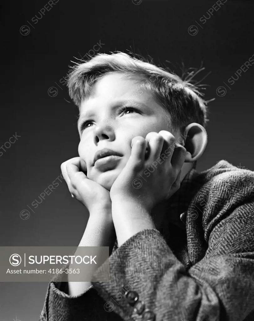 1940S Bored Serious Boy Waiting Chin Resting In Hands