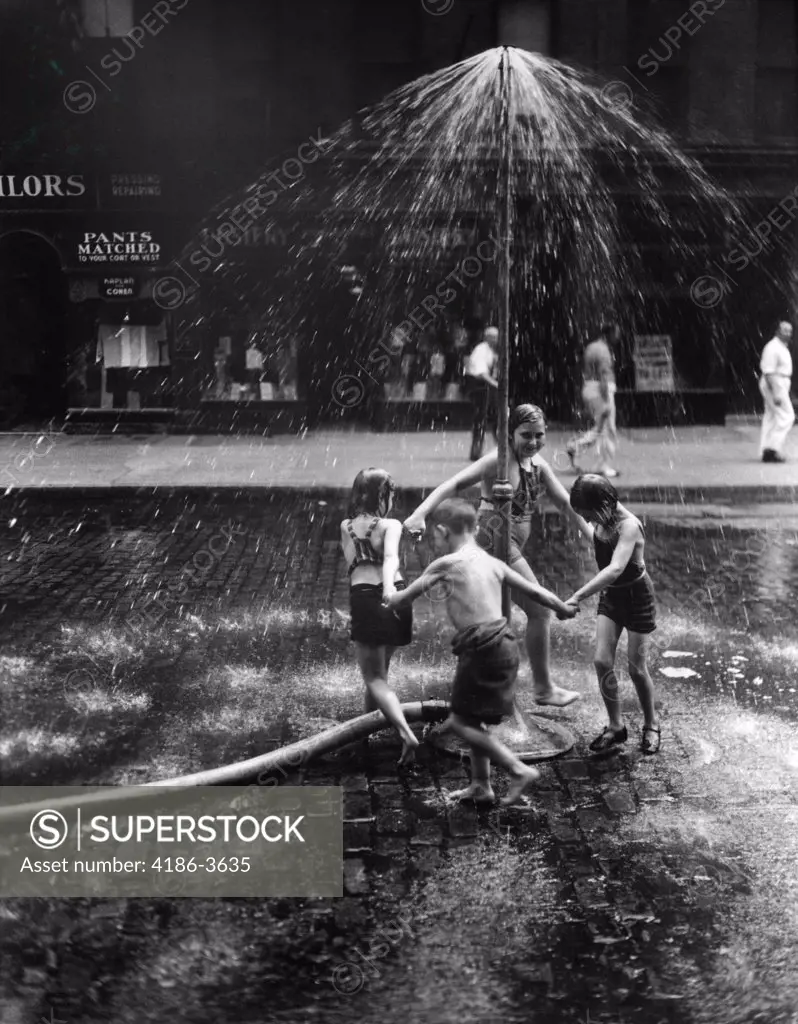 1930S Inner City Children Playing In Spray From Fire Hydrant Water Sprinkler
