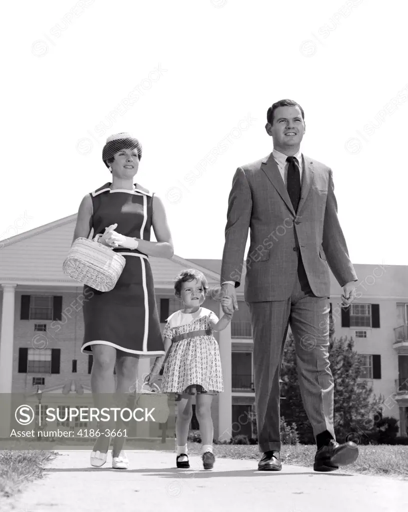 1960S 1970S Family Taking A Walk Sidewalk