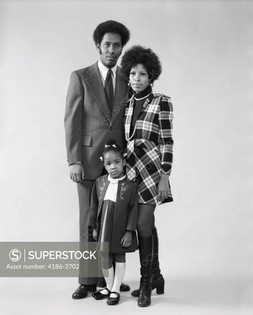 1970S African American Family Father Mother Daughter Standing Together