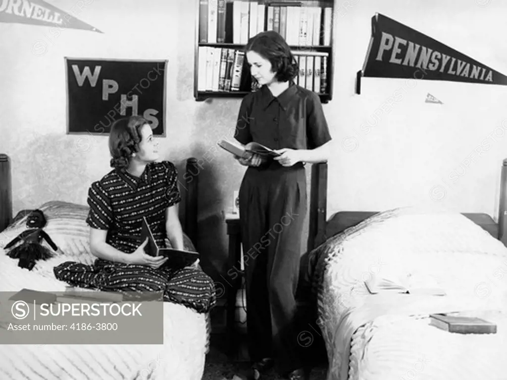 1930S 1940S Two Teen Girls Room Mates College School Dorm Room Talking Holding Books Study