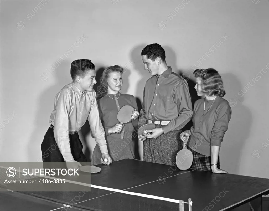 1940S Two Teen Couples Boys Girls Hold Paddles By Ping Pong Table