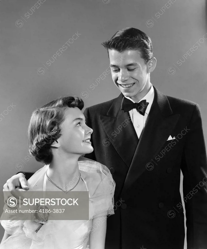 1950S Young Teen Couple Boy Girl Dressed In Formal Attire For High School Prom