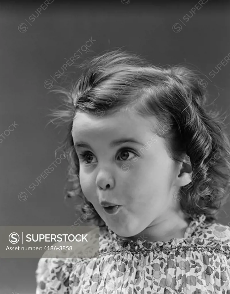 1930S Portrait Brunette Little Girl With Surprised Amazed Facial Expression