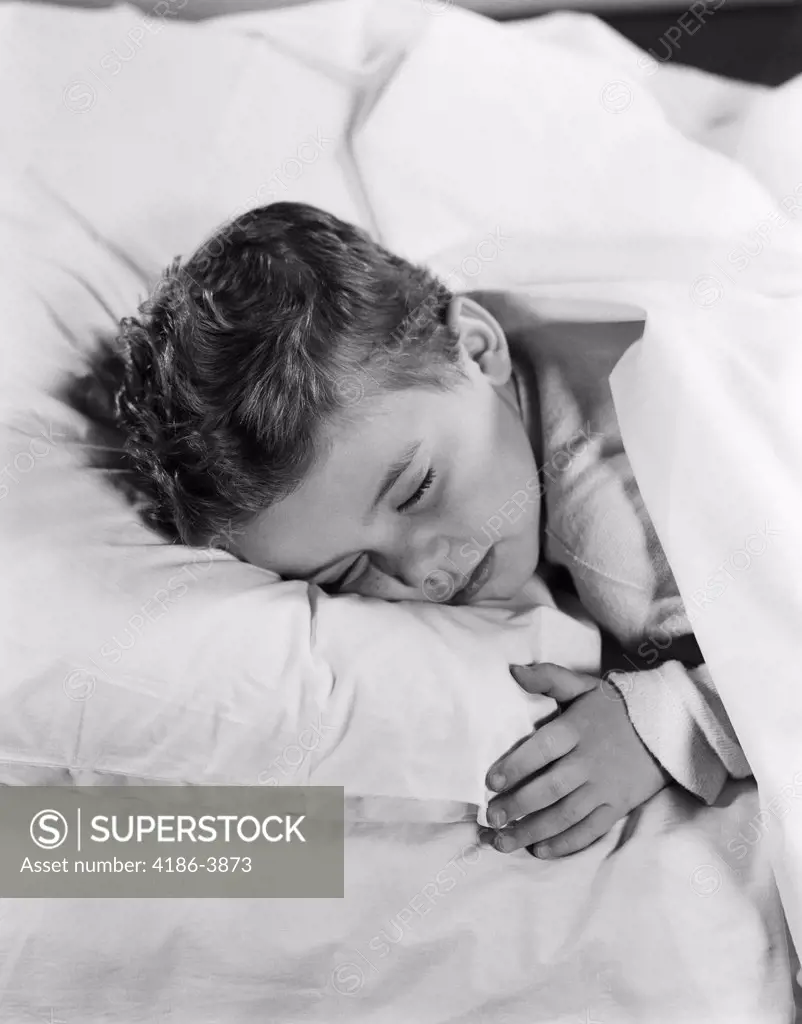 1950S Child Little Boy Sleeping In Bed