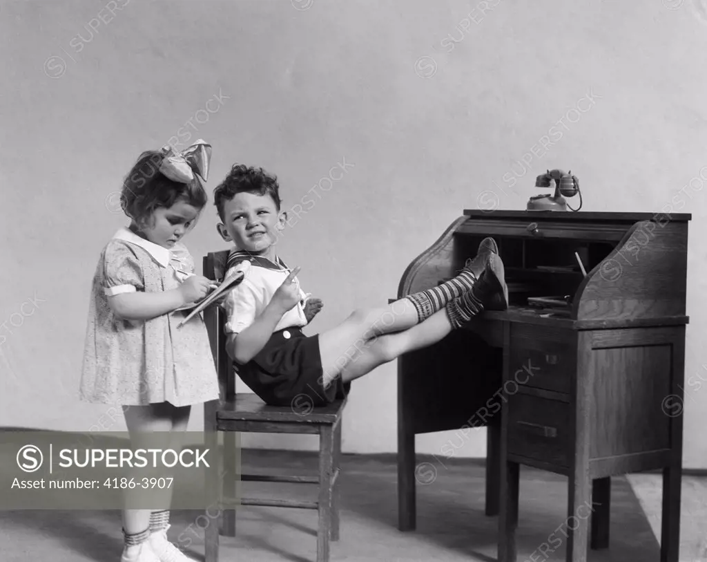 1930S Two Children Boy And Girl Playing Office Boss Feet On Desk Secretary Taking Dictation