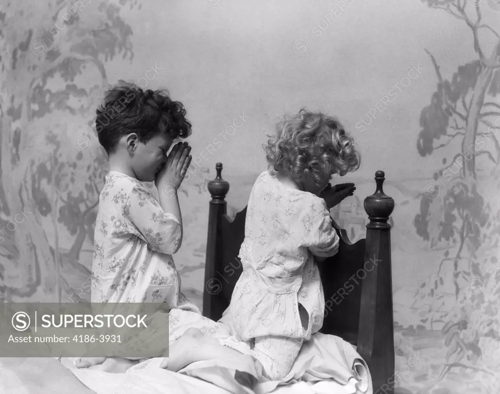 1930S Boy Girl At End Of Bed In Pajamas Saying Prayers Praying