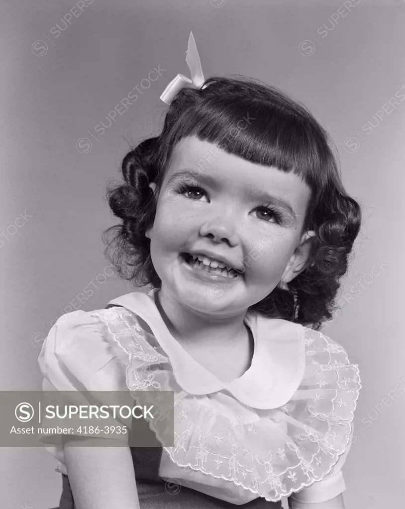 1950S Smiling Brunette Girl With Bangs 