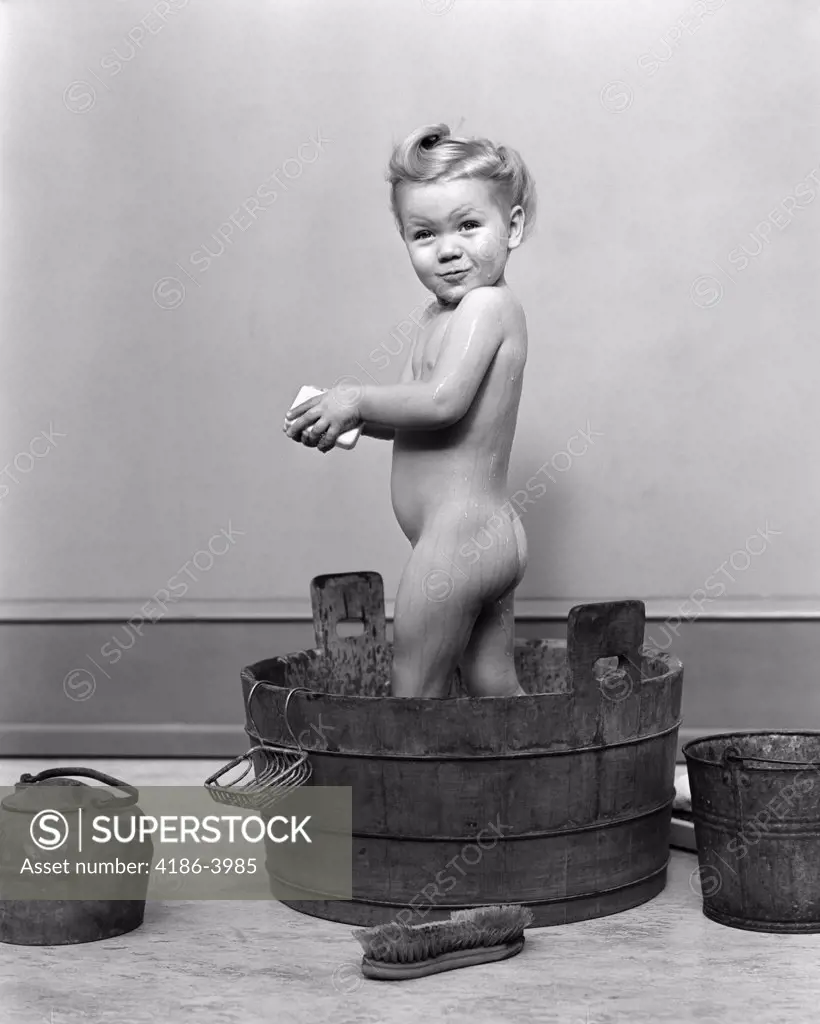 1940S Little Blond Girl Standing In Wooden Washtub Holding Bar Of Soap Taking A Bath