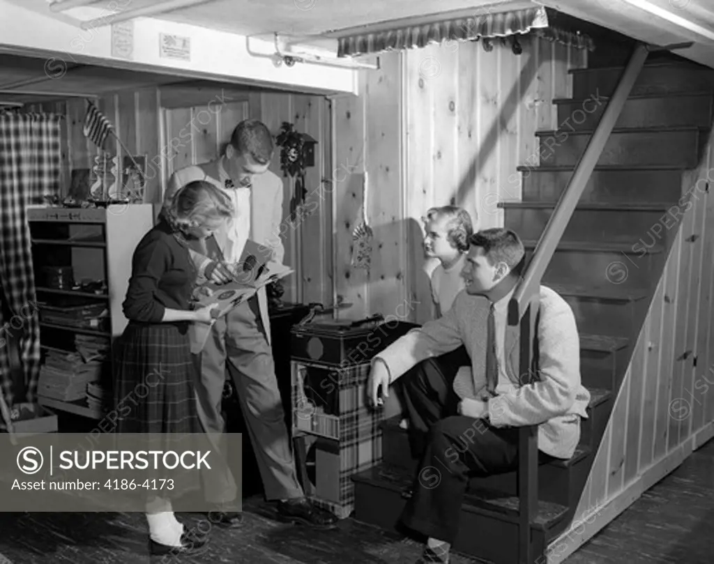 1950S Group Teens Boys Girls Playing Records On Phonograph Knotty Pine Rec Room