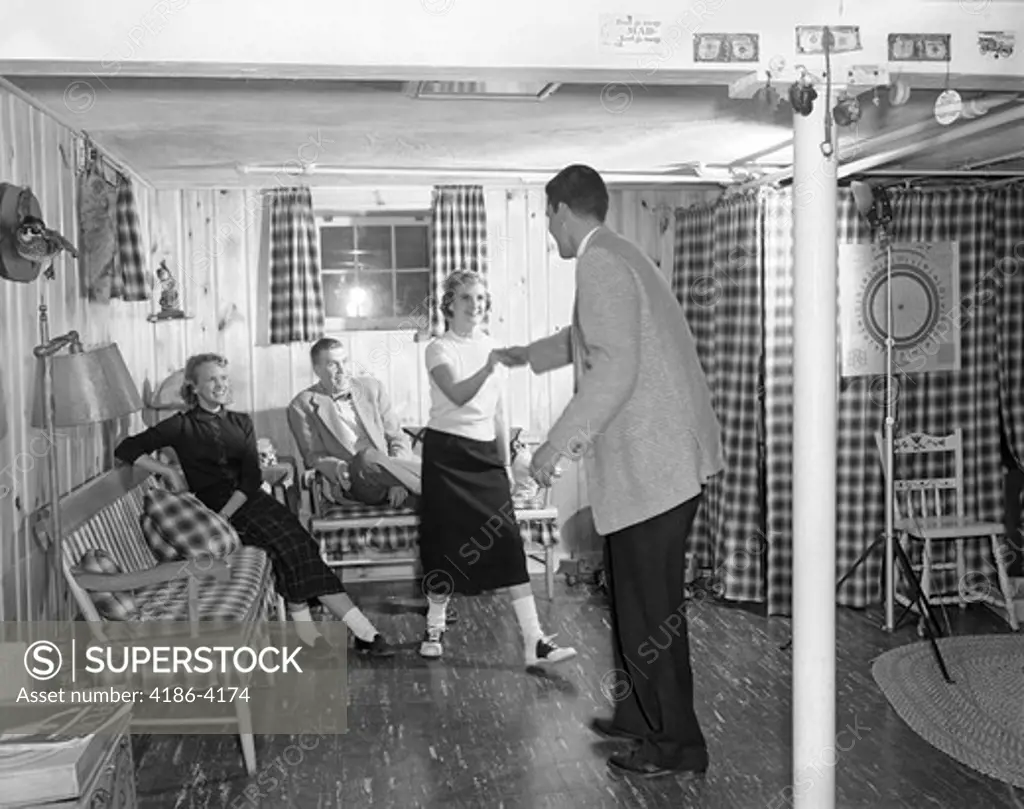 1950S Teens In Rec Room Dancing