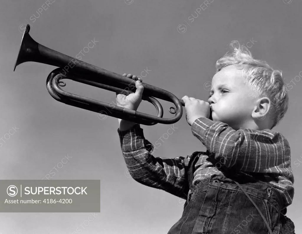 1940S Boy Blowing Bugle Outdoor