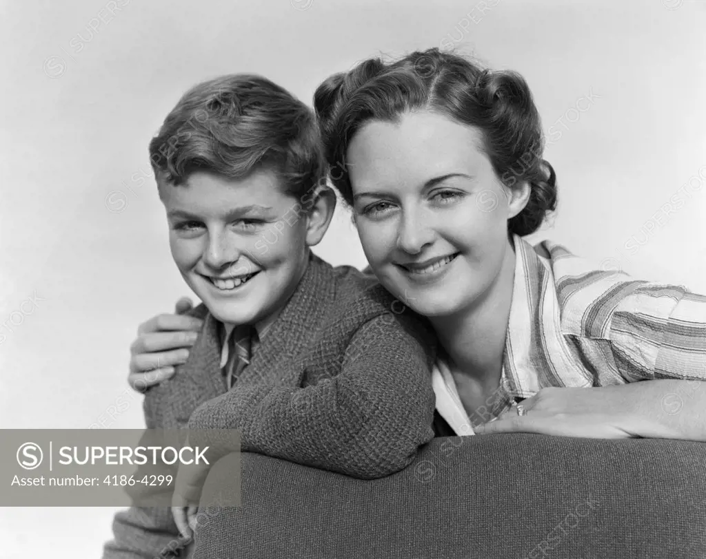 1940S Portrait Boy And Woman Smiling  