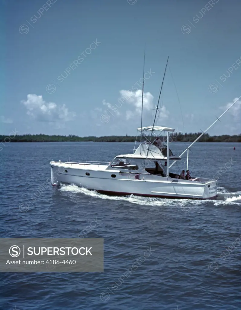 1960S Men Cruising On Deep Sea Fishing Boat