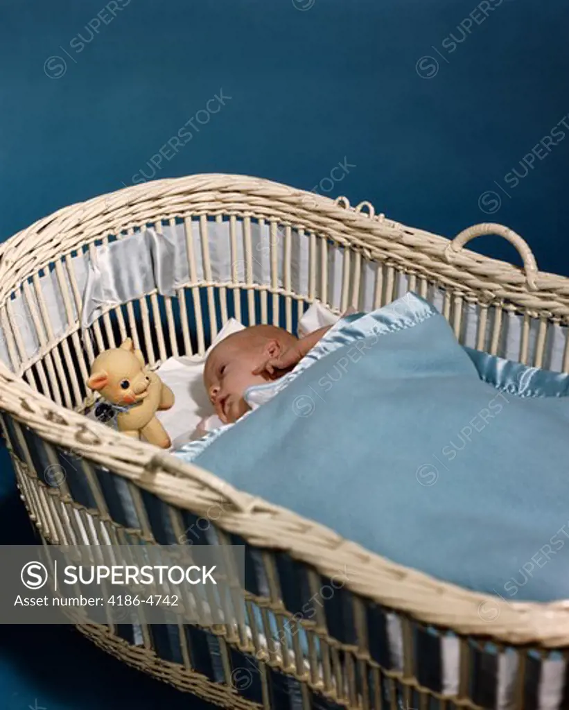 1950S Baby Sleeping In Wicker Crib Blue Blanket 