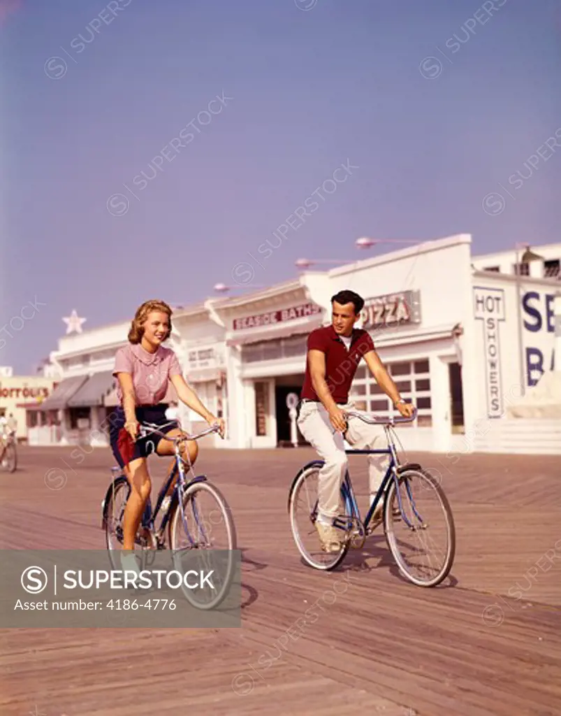 1950S Teen Couple Riding Bikes On The Boardwalk Jersey Shore