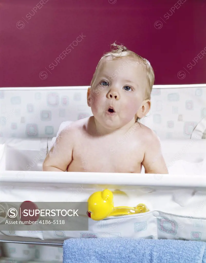 1960S Baby In Layette Bath Making Funny Face
