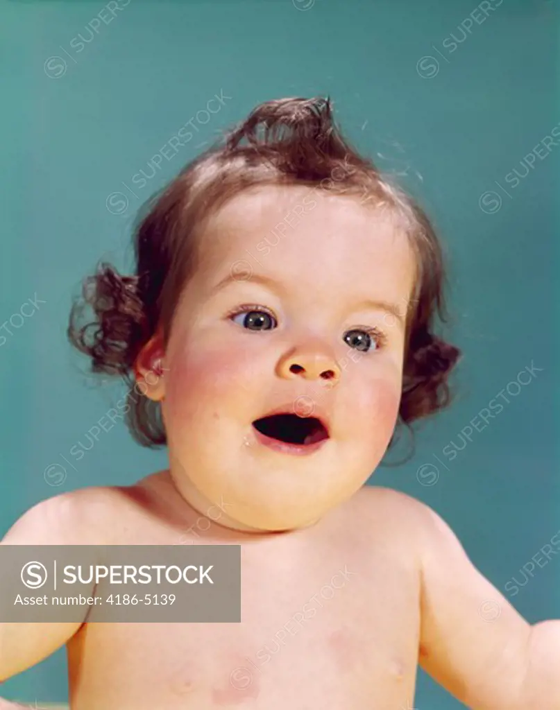 1960S Brunette Baby Head Shoulders Mouth Open Facial Expression Of Wonder