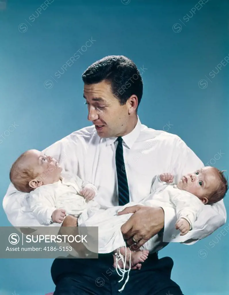 1960S Father Holding Twin Babies Infants