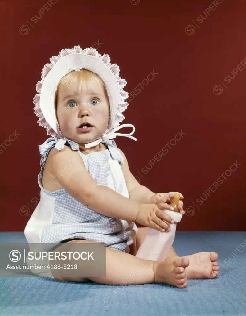 1960S Baby Girl Ruffled Bonnet Holding Bottle Funny Facial Expression
