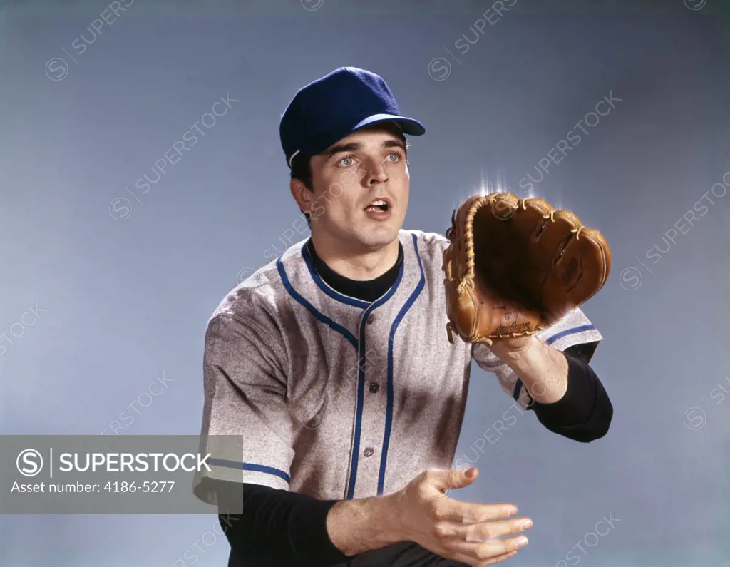 1960S Young Man In Baseball Uniform Holding Out Glove To Catch Ball Mitt Ready Alert
