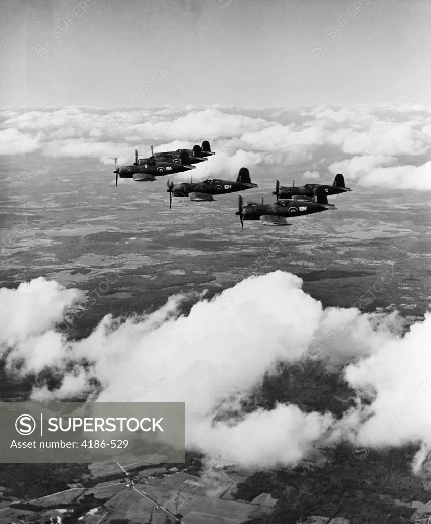1940S 6 Navy Corsairs Above The Clouds Flying In Formation Ww2