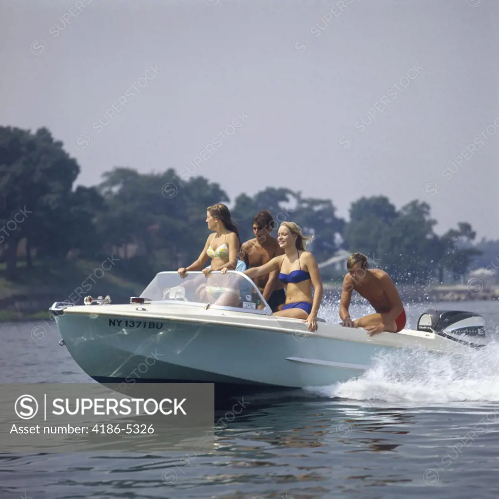 1960S Two Teen Couples In Motorboat Summer Two Piece Bathing Suit Speed Fun Summer Lake Recreation Spray