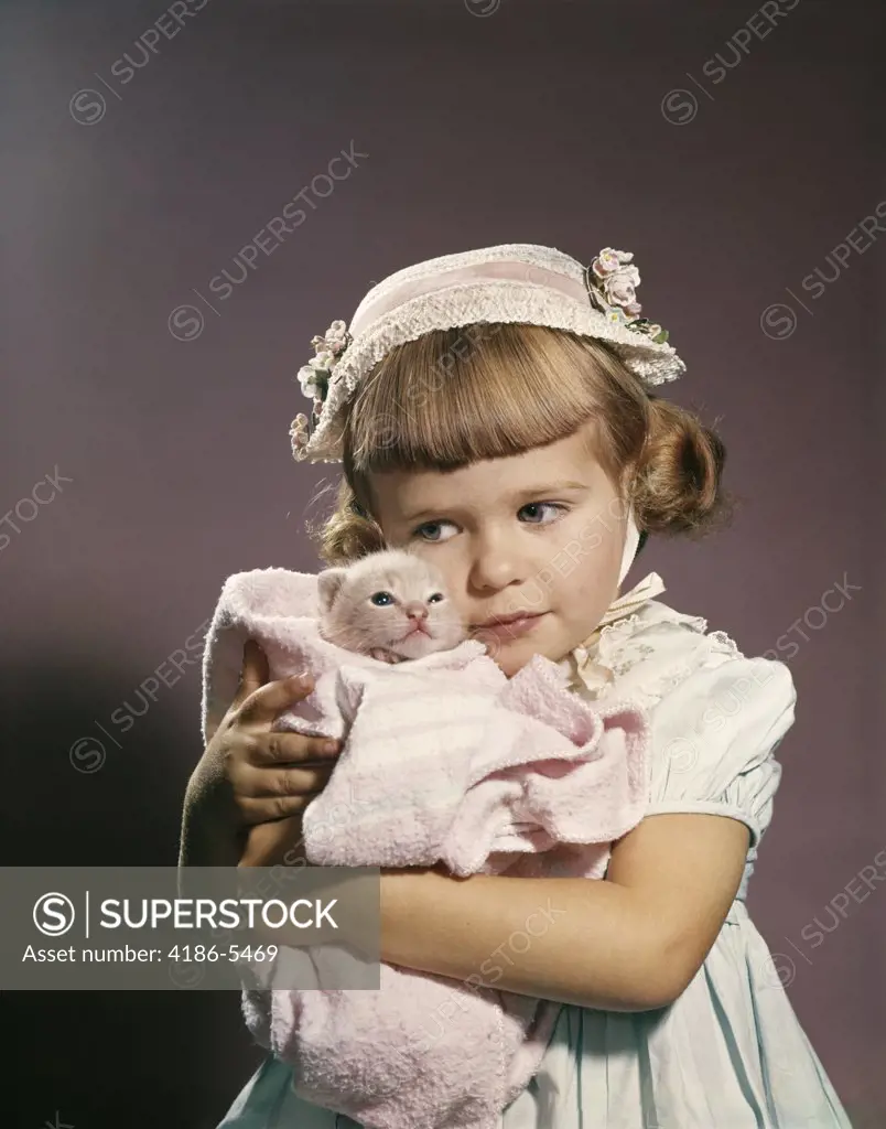 1950S 1960S Little Girl In Easter Hat Hugging A Kitten 