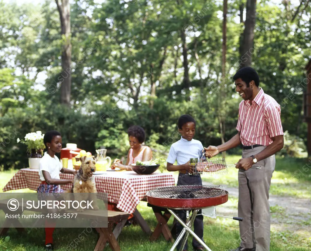 1970S African American Family Backyard Picnic Barbecue 