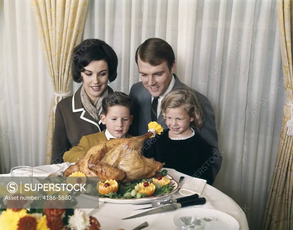 1960S 1970S Family Portrait With Holiday Roasted Turkey On Dining Table