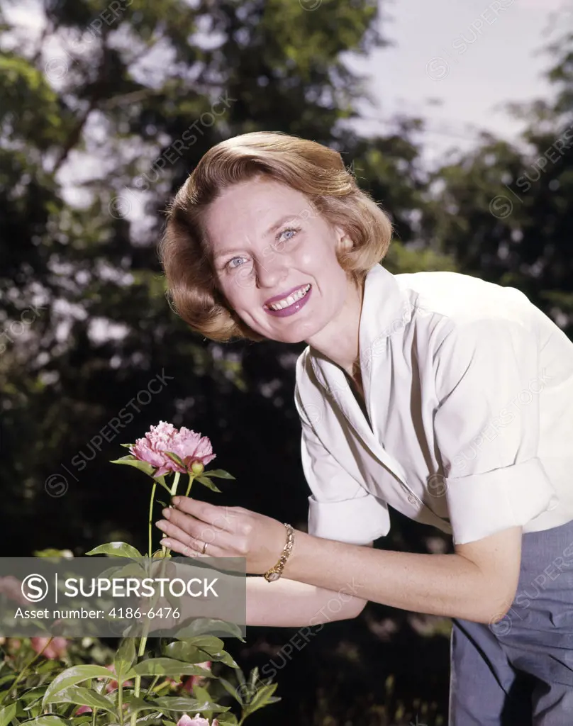 1960S Smiling Woman Portrait Picking Flower Peony From Garden Gardening Spring
