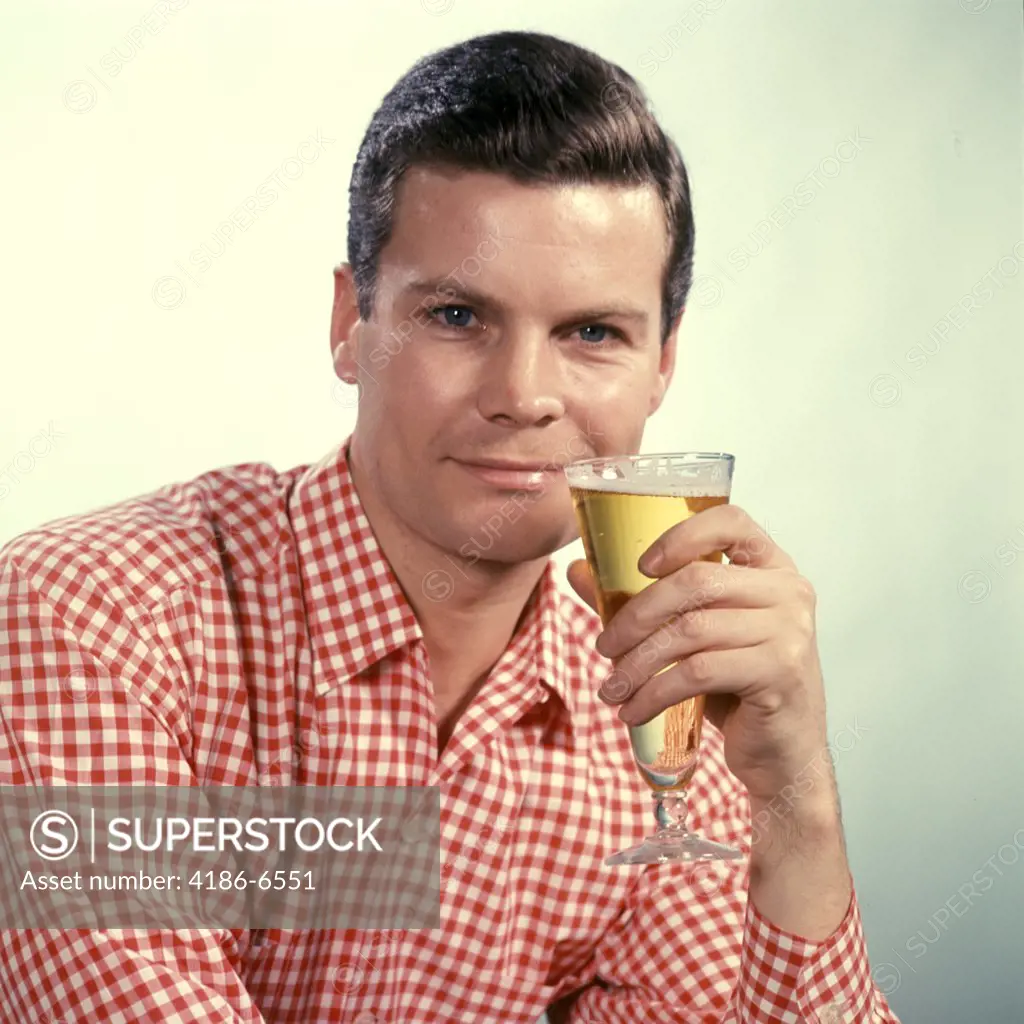 1960S Man Red Checked Shirt Drinking Beer From Pilsner Glass