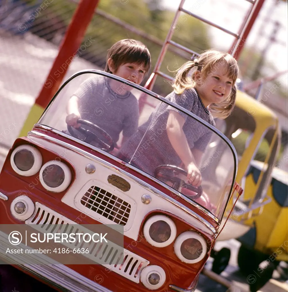 1970S Two Little Kids Children Boy Girl Driving Playing Toy Bus Car Fire Truck Fire Engine Amusement Park Ride