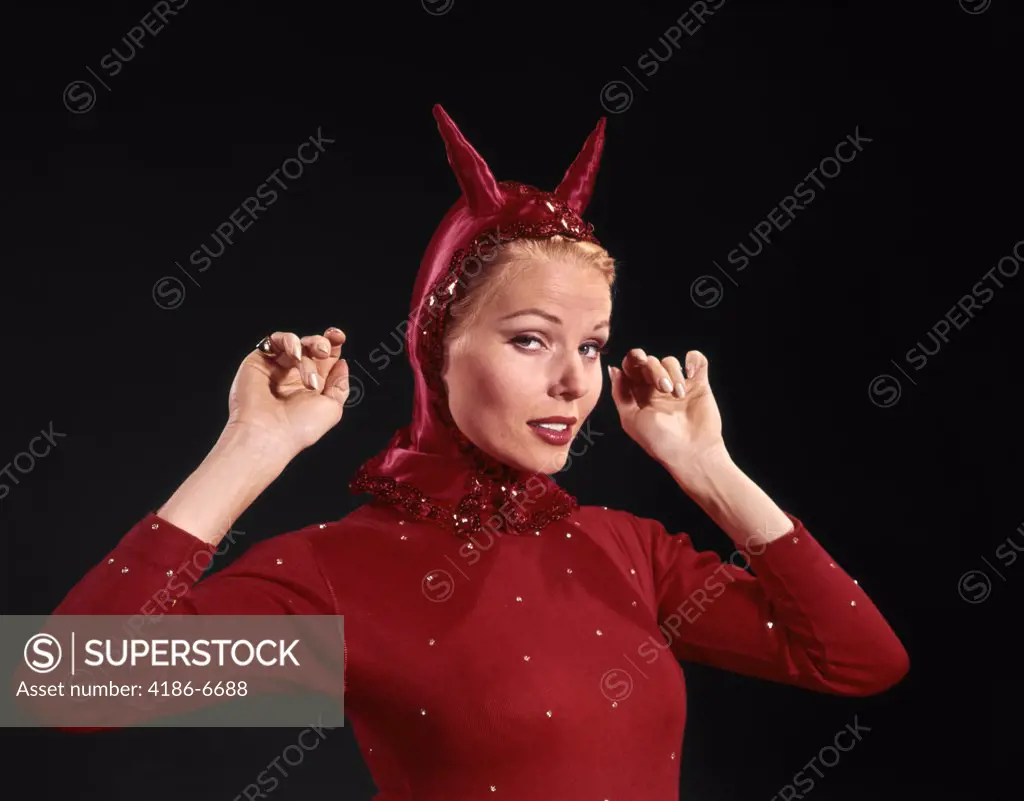 1960S Woman Red Devil Costume With Horns Arms Up In Air Looking Seductively At Camera