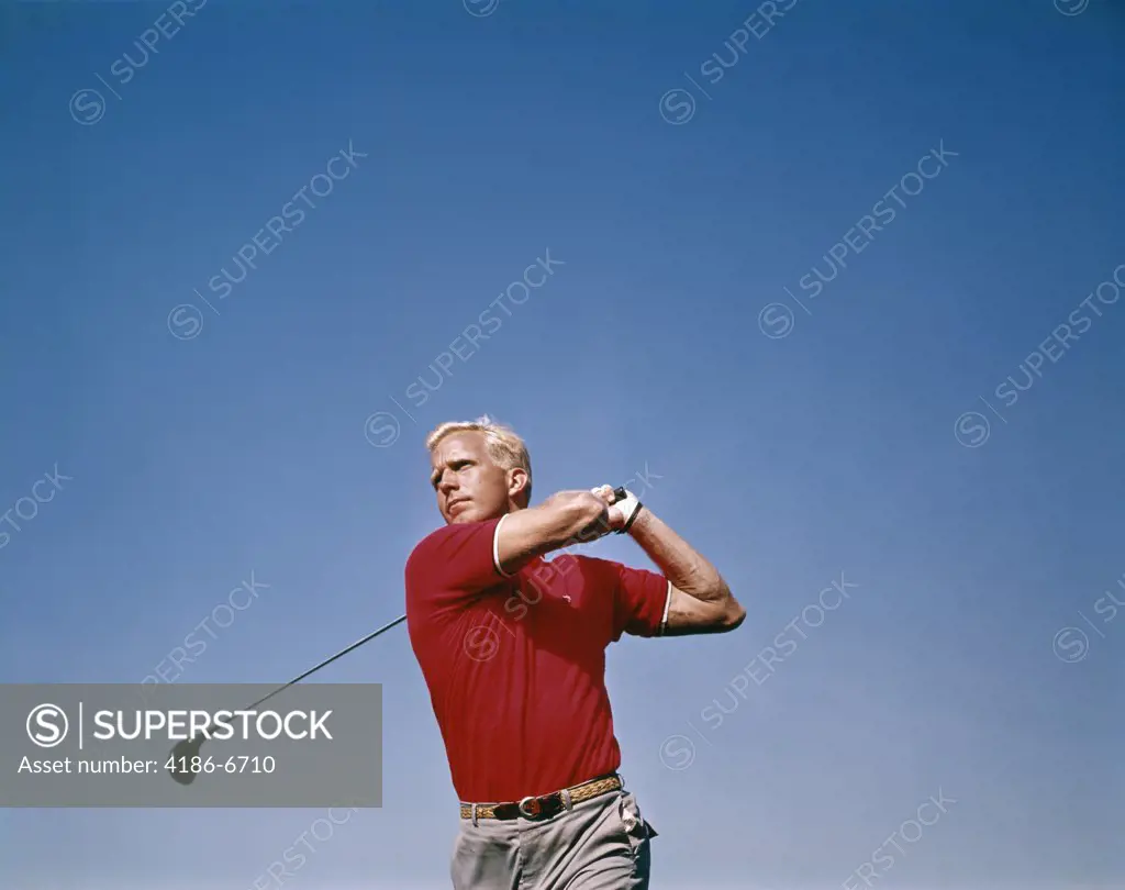 1960S Man Driving Golf Ball Swing Follow Through