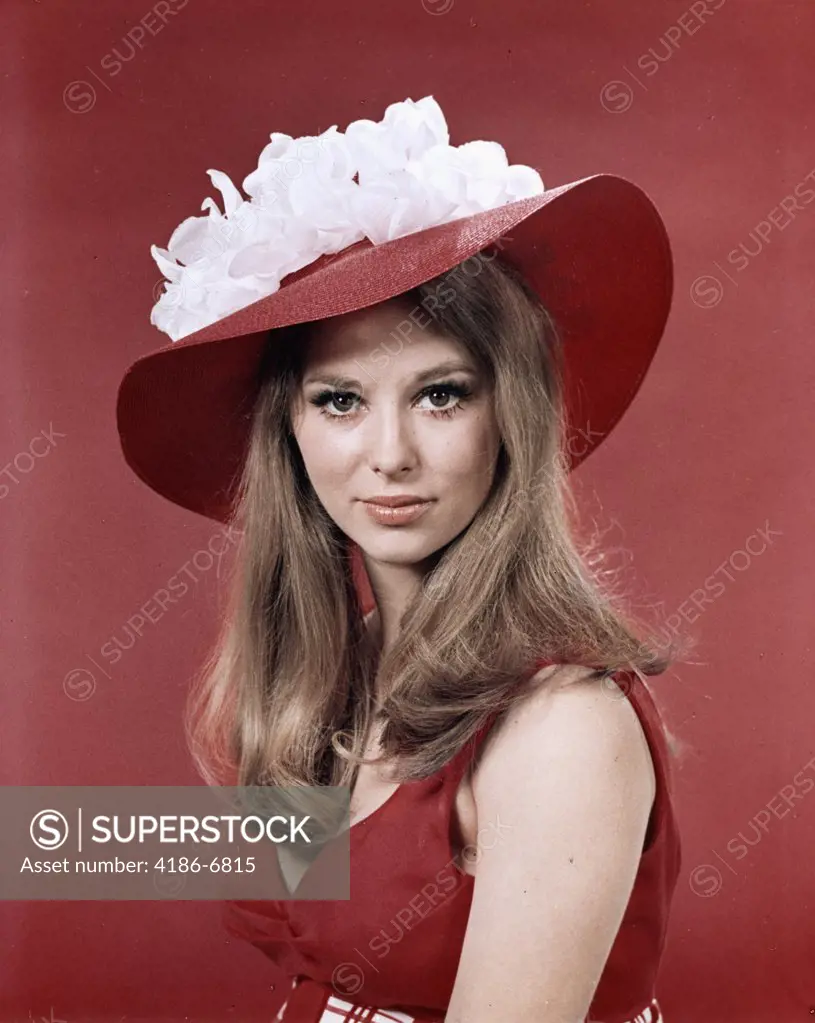 1960S Brunette Woman Portrait Wearing A Large Red Hat