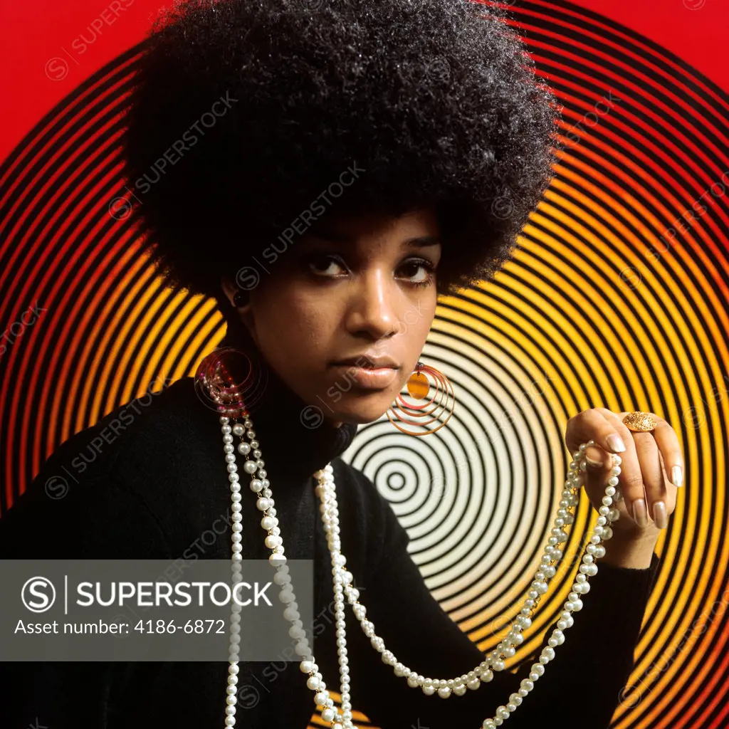 1970S Portrait Of Young African-American Woman Afro Hairstyle And Long Strands Of Pearls